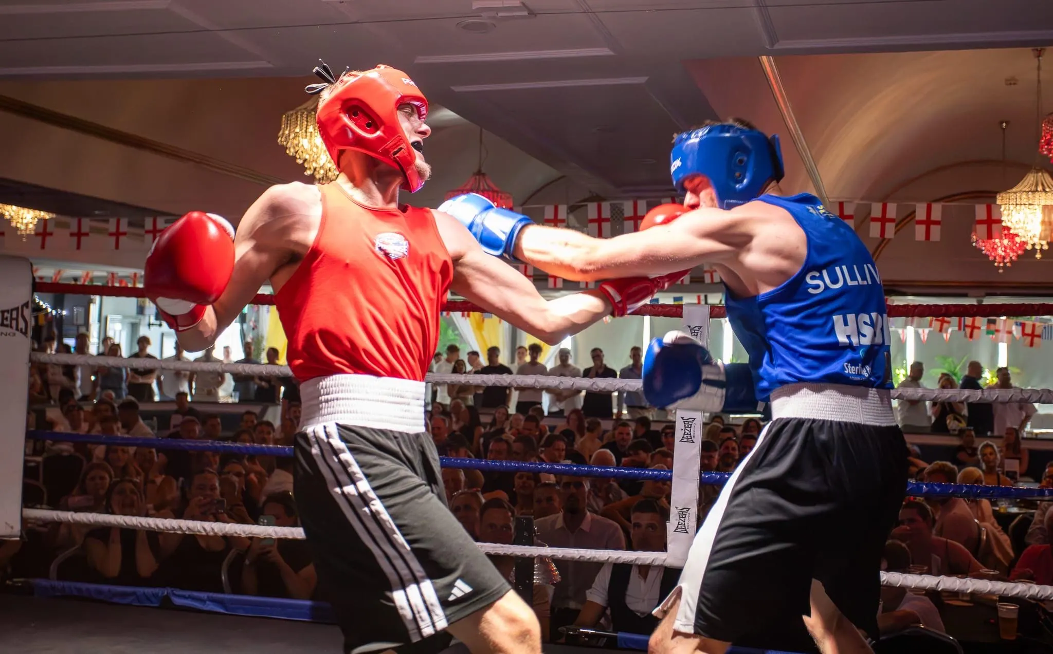 Action shot during a live boxing exchange