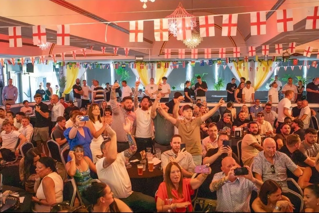 Supporters watching and cheering during the event